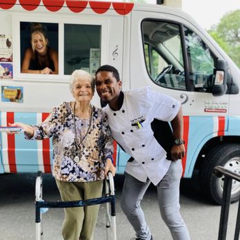 Birdie Lu's - a man and a woman standing in front of a food truck - Food Trucks Near Me Birdie Lu's - a man and a woman standing in front of a food truck - Food Trucks Near Me