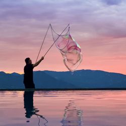 Fire Pixie Entertainment - Giant bubbles at sunset