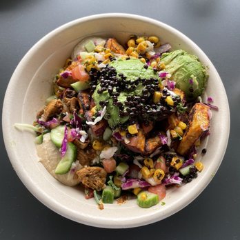 CAVA - Make your own bowl with chicken, hummus, avocado, cucumbers and corn. - Mediterranean Near Me - The Woodlands, Texas