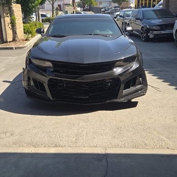 One Stop Auto - Damaged car, parking lot - Body Shops Near Me - Corona, California