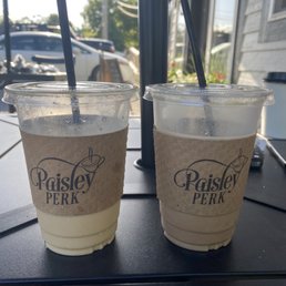 two cups of coffee on a table