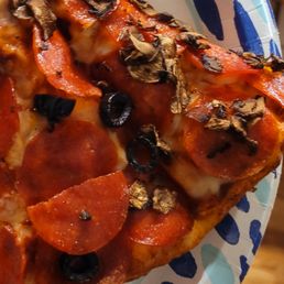 Pepperoni, black olives, and mushrooms. So good.
