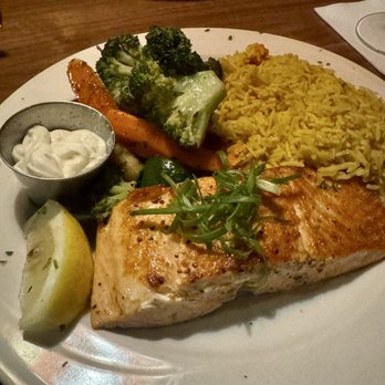 The Melrose Grill - Salmon filet dinner with the vodka, dill sauce on the side. - Steakhouses Near Me - Renton, Washington The Melrose Grill - Salmon filet dinner with the vodka, dill sauce on the side. - Steakhouses Near Me - Renton, Washington
