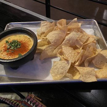 Tacos Tequila Whiskey - Chips with queso - Whiskey Bars Near Me - Denver, Colorado Tacos Tequila Whiskey - Chips with queso - Whiskey Bars Near Me - Denver, Colorado