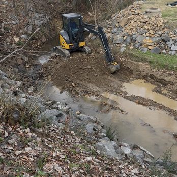 RJ Outdoor Services - Cleaning out excess sand and rock build up in this small backyard creek - Tree Services Near Me - Alexander, Arkansas RJ Outdoor Services - Cleaning out excess sand and rock build up in this small backyard creek - Tree Services Near Me - Alexander, Arkansas