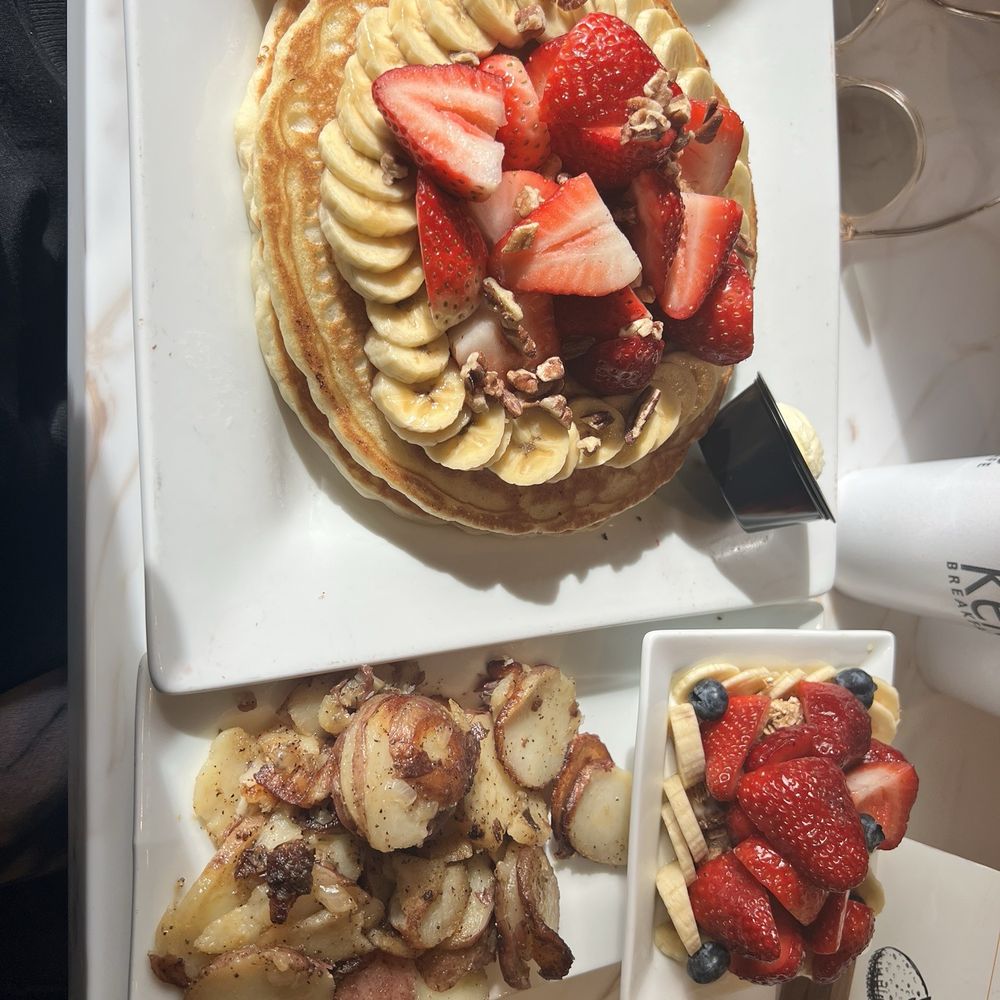 Keke's Breakfast Cafe - Pecan Pancakes with strawberries and bananas Seasoned potatoes Fruit & Yogurt Cup - Breakfast & Brunch Near Me - Jacksonville, Florida Keke's Breakfast Cafe - Pecan Pancakes with strawberries and bananas Seasoned potatoes Fruit & Yogurt Cup - Breakfast & Brunch Near Me - Jacksonville, Florida