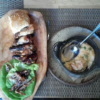Husk - Left-over to-take items, 2 pig ear wraps, smoked wings, shrimp and grits, benne bread, all divine! - American Near Me - Charleston, South Carolina