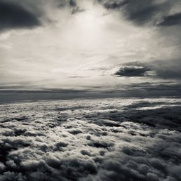 ...and the clouds hung heavy as if holding us up above London ...and the clouds hung heavy as if holding us up above London