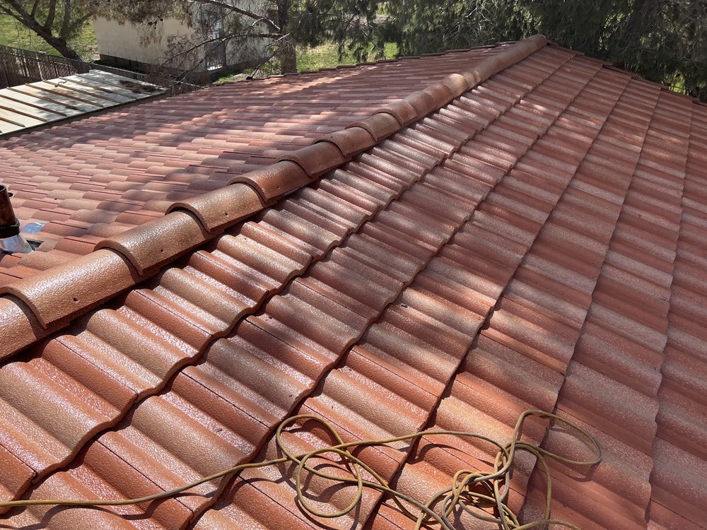 Slide of ARM Roofing Specialists