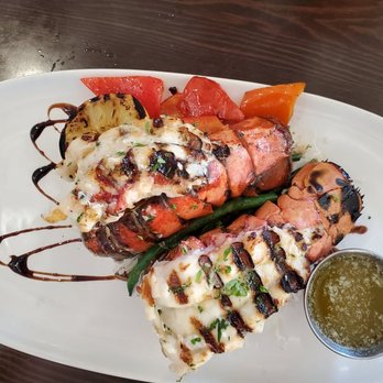 Catch Kitchen + Bar - 2 Lobster tables. Very well cooked and delicious. Great food in a great atmosphere. Wonderful kind stuff. - Sports Bars Near Me - Richmond, British Columbia