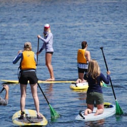 By Land and Sea Stand Up Paddle - Leading an awesome group of girls in a group paddle lesson