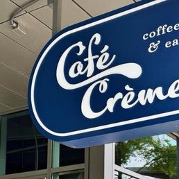 Exterior outside entrance of Café Crème - Sign facing 2nd Street & Shoal Creek - Austin, Texas Exterior outside entrance of Café Crème - Sign facing 2nd Street & Shoal Creek - Austin, Texas
