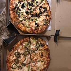Both of these pizzas are supposed to have 5 toppings. Not even sure why whatever toppings they do have are so unevenly spread.
