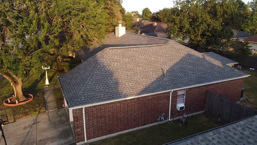 Slide of Spartan Roofing