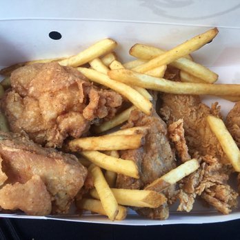 PFK - a box of fried chicken and french fries - Fast Food Near Me - Montreal, Quebec PFK - a box of fried chicken and french fries - Fast Food Near Me - Montreal, Quebec