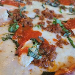 Lasagne pizza extra cheesy.