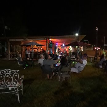 The Rabbit Hole - people sitting outside at night - Pubs Near Me - Elba, Alabama The Rabbit Hole - people sitting outside at night - Pubs Near Me - Elba, Alabama