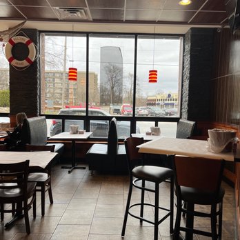 The Krazy Crab - a restaurant with tables and chairs - Seafood Near Me - Farmington, Michigan