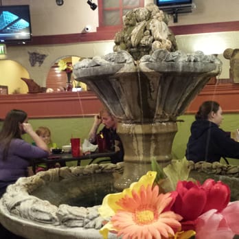 Tequila Sunrise - Fountain, lots of kids would throw coins in it. - Mexican Near Me - Brownsburg, Indiana Tequila Sunrise - Fountain, lots of kids would throw coins in it. - Mexican Near Me - Brownsburg, Indiana