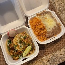 La Costa - Al pastor and carnitas taco with side of rice and beans