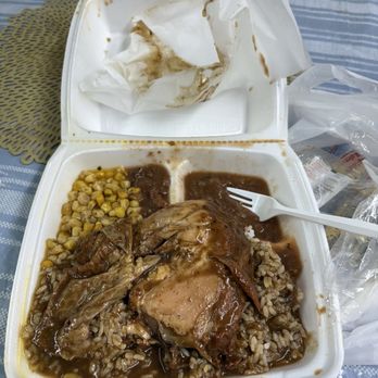 Guidroz's Food Center - Smothered chicken with rice and gravy, corn, red beans, and not visible are the collard greens already consumed. - Grocery Near Me - Lafayette, Louisiana Guidroz's Food Center - Smothered chicken with rice and gravy, corn, red beans, and not visible are the collard greens already consumed. - Grocery Near Me - Lafayette, Louisiana