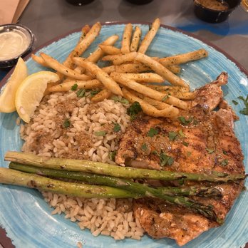 Simply Fish Seafood - Blackened Cajun Salmon, brown rice, fries and asparagus. Hella good! - Fish & Chips Near Me - Costa Mesa, California Simply Fish Seafood - Blackened Cajun Salmon, brown rice, fries and asparagus. Hella good! - Fish & Chips Near Me - Costa Mesa, California
