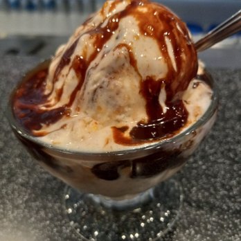 Dewar's Candy Shop - Child's sundae with peanut butter fudge ice cream and hot fudge topping - Candy Stores Near Me - Bakersfield, California
