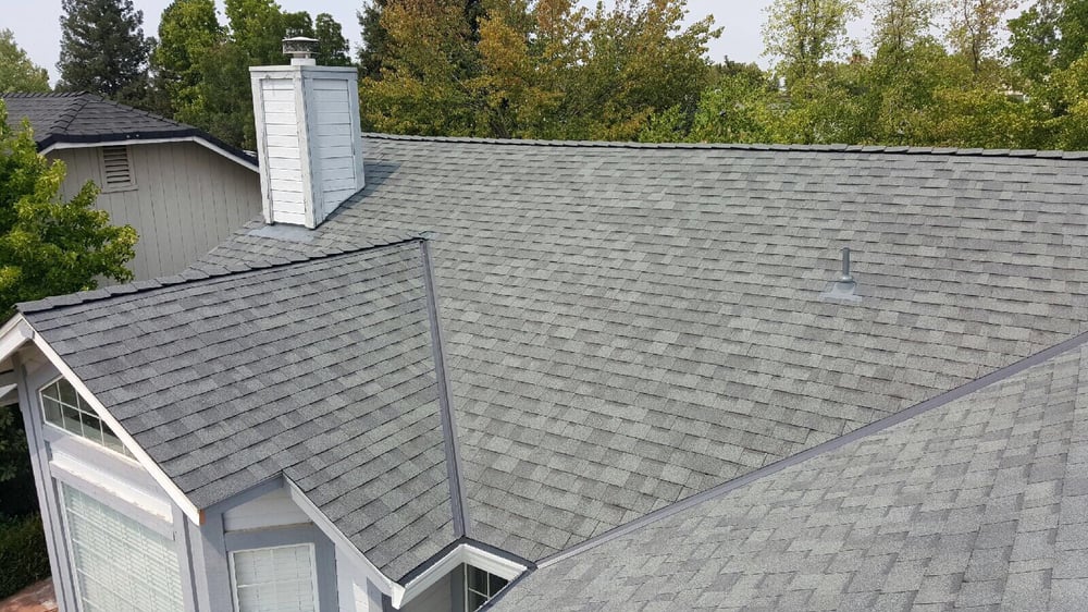 Slide of Hutch's Roofing Company