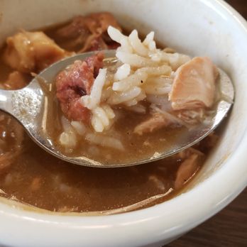 Chris' Poboys - bowl of soup with a spoon in it - Sandwiches Near Me - Lafayette, Louisiana Chris' Poboys - bowl of soup with a spoon in it - Sandwiches Near Me - Lafayette, Louisiana