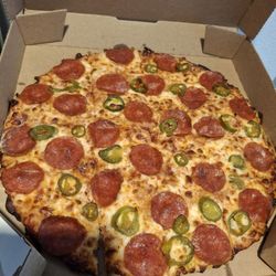 Thin crust pepperoni and jalapeño with extra cheese and light sauce. Didn't get the light sauce nor the extra cheese but hey, its Domino's
