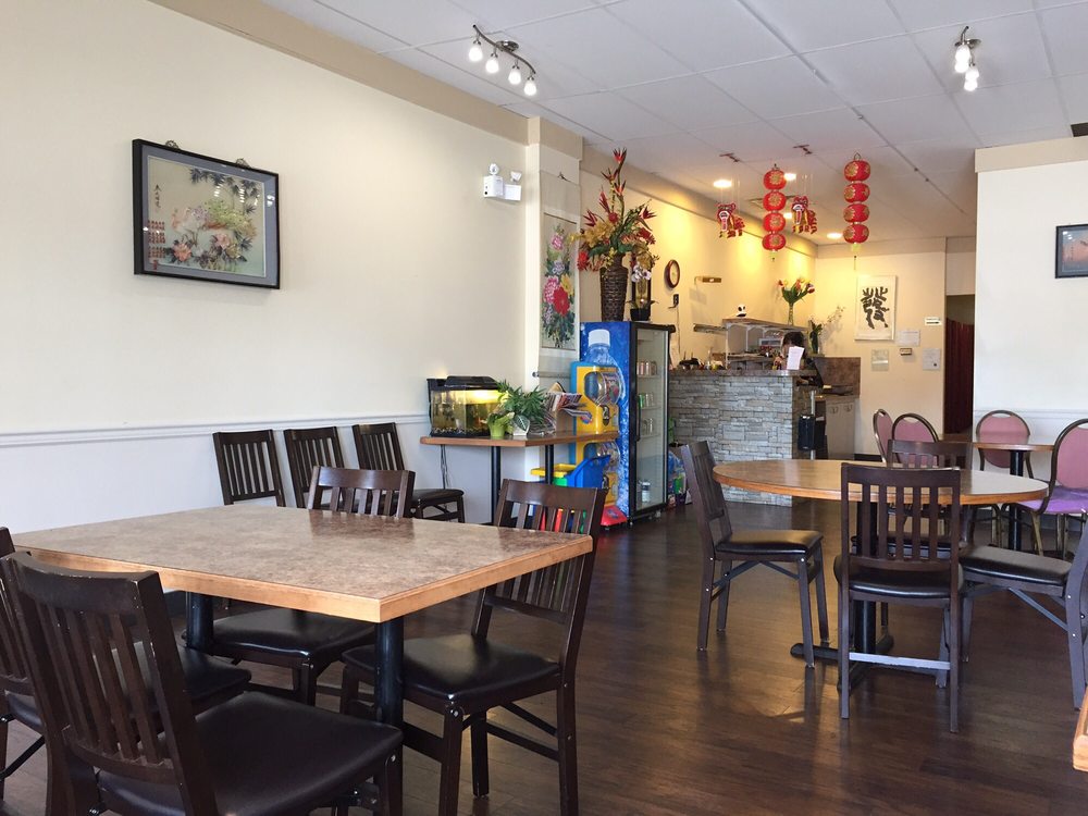 Wok Inn Restaurant Logo