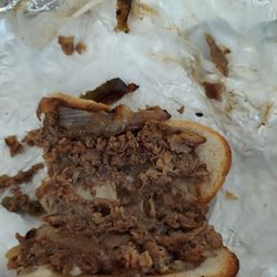 Baby Suga's Cheesesteak Shack - 2-3 onion/pepper slices on the whole sandwich, crumbly reheated meat