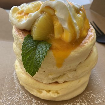 Motto Tea Cafe - Mango souffl pancake. There's chucks of star berry, blueberries, and pineapple on top with cream. - Desserts Near Me - Pasadena, California Motto Tea Cafe - Mango souffl pancake. There's chucks of star berry, blueberries, and pineapple on top with cream. - Desserts Near Me - Pasadena, California