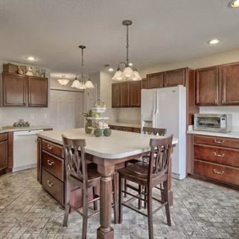 Cabinet Services - a kitchen with a center island - General Contractors Near Me - Lexington, South Carolina