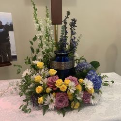Potting Bench Florist & Gifts - Kelly brought me and my brother's vision to life to honor our Father's urn for his funeral.