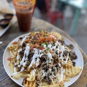 Que Onda Tacobar - Papa Loca Specialty with a Modelo Negra Michelada - Tacos Near Me - Vacaville, California Que Onda Tacobar - Papa Loca Specialty with a Modelo Negra Michelada - Tacos Near Me - Vacaville, California