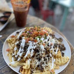 Que Onda Tacobar - Papa Loca Specialty with a Modelo Negra Michelada
