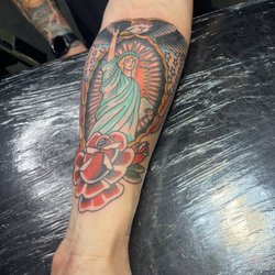 Golden Child Tattoo & Piercing Shop - Traditional lady of liberty piece by Johnny @sanctifiedentity