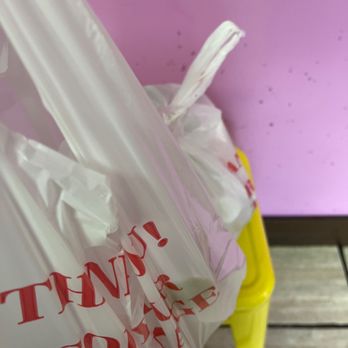 California Taco Shop - a bag of taco sitting on a chair - Mexican Near Me - Pawtucket, Rhode Island