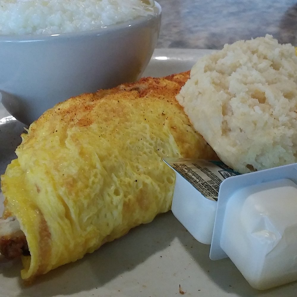 Scrambles Cafe - Cajun Chicken Omelet with Biscuit and a bowl of Grits. - Breakfast & Brunch Near Me - Ocala, Florida Scrambles Cafe - Cajun Chicken Omelet with Biscuit and a bowl of Grits. - Breakfast & Brunch Near Me - Ocala, Florida