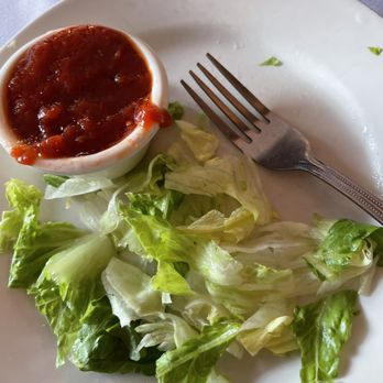 Napoli's Italian Restaurant - Tomato Vinaigrette with the salad. - Italian Near Me - Marion, Iowa Napoli's Italian Restaurant - Tomato Vinaigrette with the salad. - Italian Near Me - Marion, Iowa