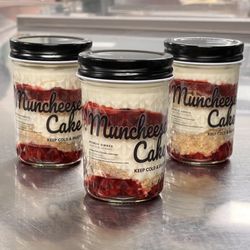 Classic strawberry Muncheese Cake, the best seller! Made with cream cheese, not baked, layered with galletas María (mexican cookies).