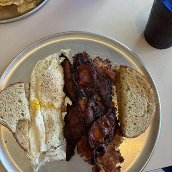 Smokin' Little Diner - Ala carte platter: two eggs and toast, corned beef hash, and three strips of smoked jalapeño bacon - Barbeque Near Me - Depew, New York Smokin' Little Diner - Ala carte platter: two eggs and toast, corned beef hash, and three strips of smoked jalapeño bacon - Barbeque Near Me - Depew, New York