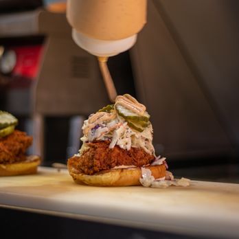 Nate's Nashville Hot Chicken - a chicken sandwich being made - Chicken Shop Near Me - Paso Robles, California Nate's Nashville Hot Chicken - a chicken sandwich being made - Chicken Shop Near Me - Paso Robles, California