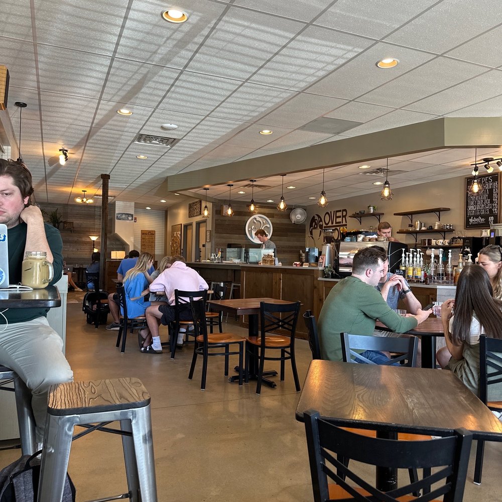 Over Flow Coffee House - people sitting at tables - Creperies Near Me - Liberty, Missouri