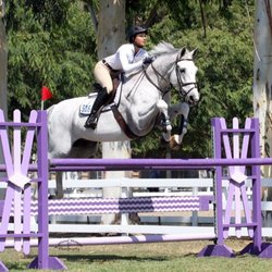 Trainer/Owner Courtney Welch riding in competition