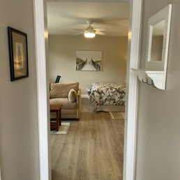 Cottage entry with new luxury vinyl tile.