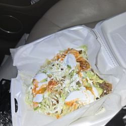 Latino Market & Taqueria El Parientito - Three sopes with meat. Almost no flavor, mostly lettuce and sour cream. Not worth $14.