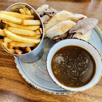 The Corner - Roast beef French dip with homemade au jus and side of steak fries. - Breakfast & Brunch Near Me - Glendale, California