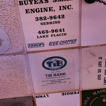 Blue Lagoon Saloon - signs on the ceiling - American Near Me - Sebring, Florida